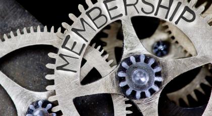 Cogs and gears with the world membership on them