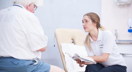Physio with elderly patient