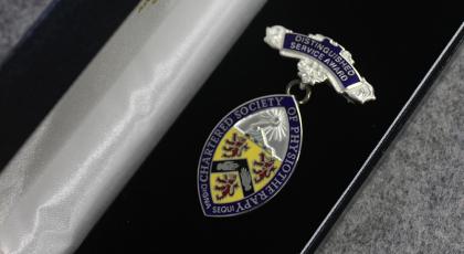 a CSP Distinguished Service Award badge