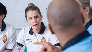 a physio and a physio support worker in a meeting