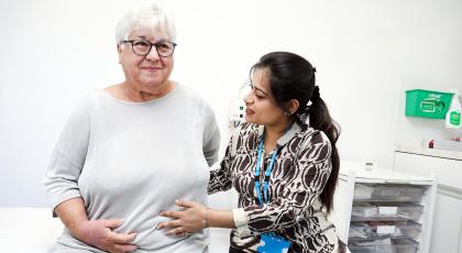 A first contact physiotherapist consults with a patient