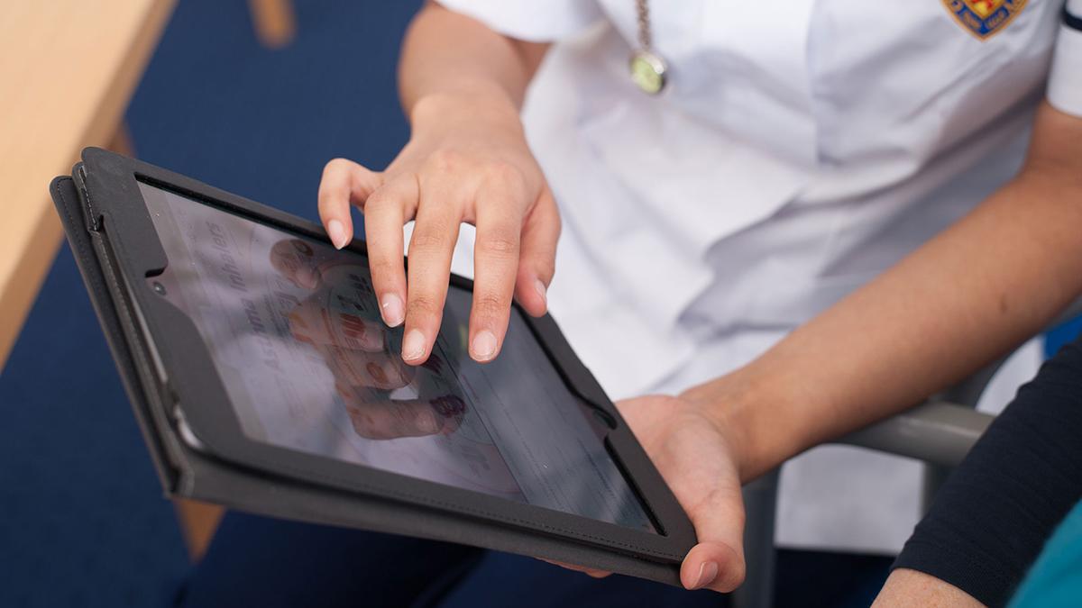 Person looking at ipad