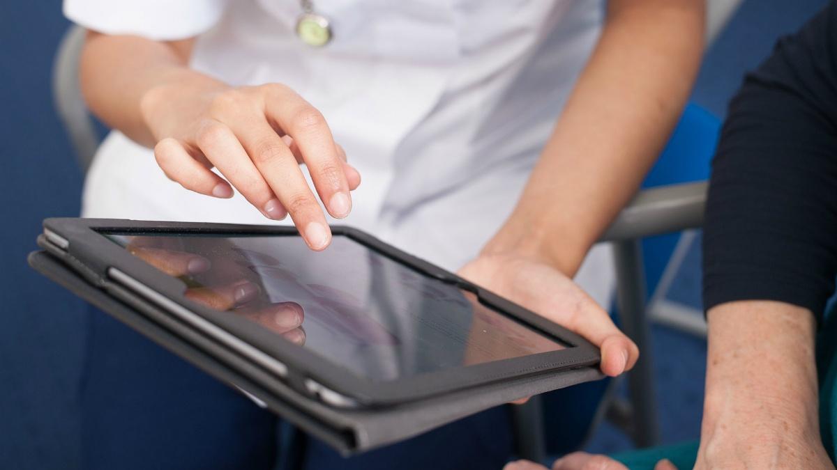 Physiotherapy tablet computer digital Physiotherapist using a tablet computer