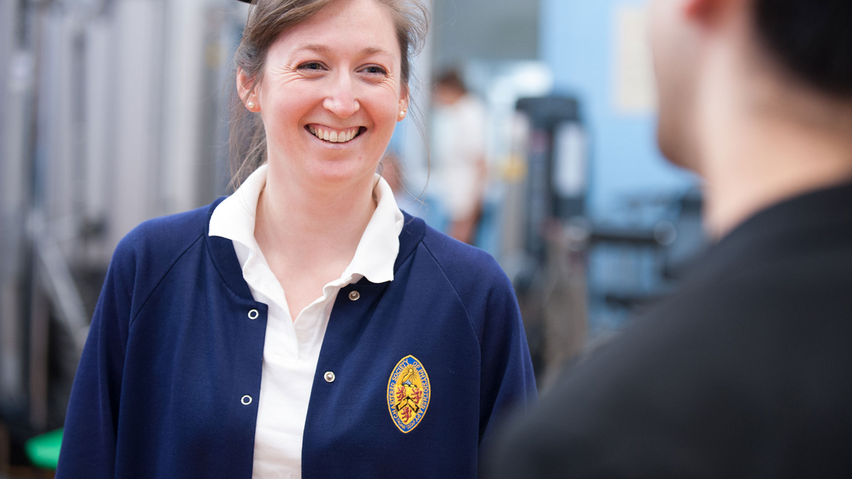 Chartered physio having friendly conversation with patient