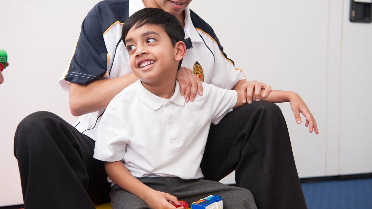 Child with cerebral palsy Child with cerebral palsy having physio