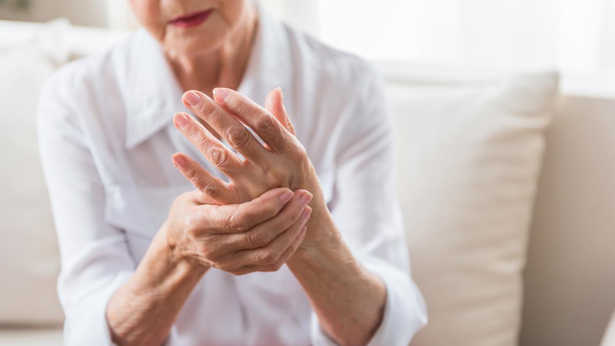 Elderly woman expressing pain