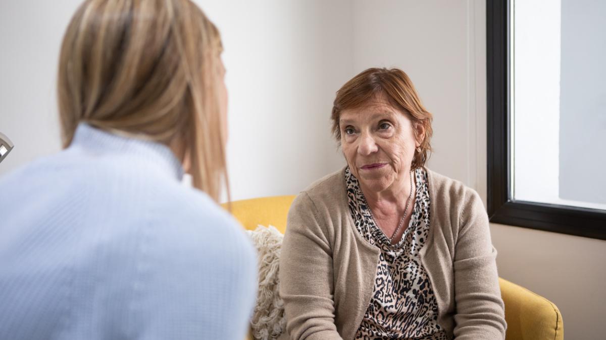 An older woman having a conversation with a healthcare professional