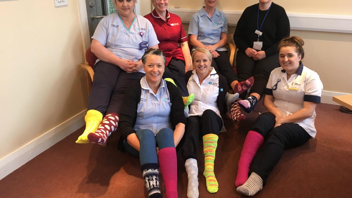 Physos wear odd socks to raise awareness of lymphoedema in Northern Ireland