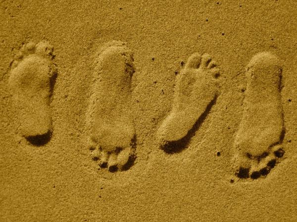 flat footprints in the sand
