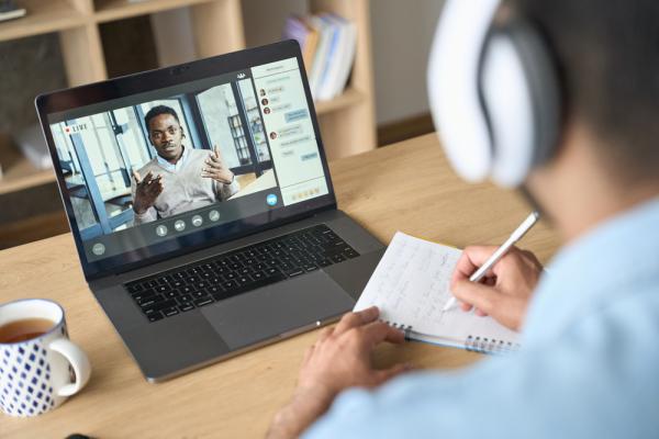 Man uses a webinar to learn