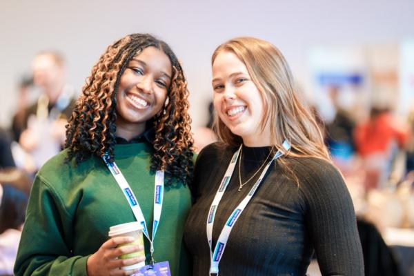 Two student conference delegates enjoy the conference in 2025. 