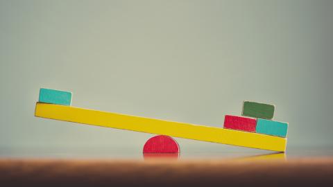 An unbalanced seesaw symbolising health inequalities