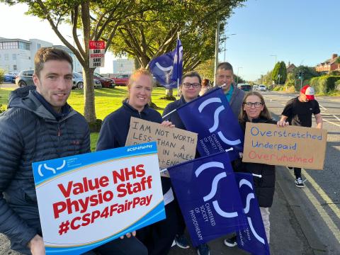 CSP members holding placards on a picket line