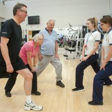Prehab physios guide patients with cancer through a physical activity at Royal Surrey County Hospital NHS Trust, in Guildford