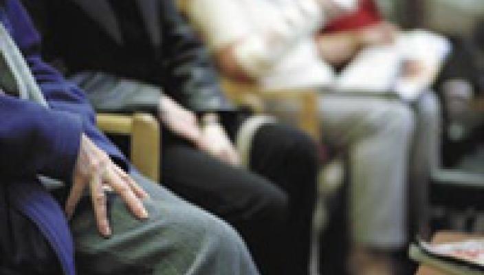 Patients sat in a waiting room