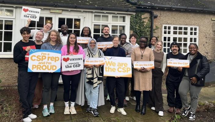 Group of equality reps smiling at the camera. The photo was taken at reps training in November.