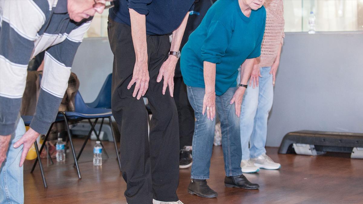 a group of elderly patients in an exercise class