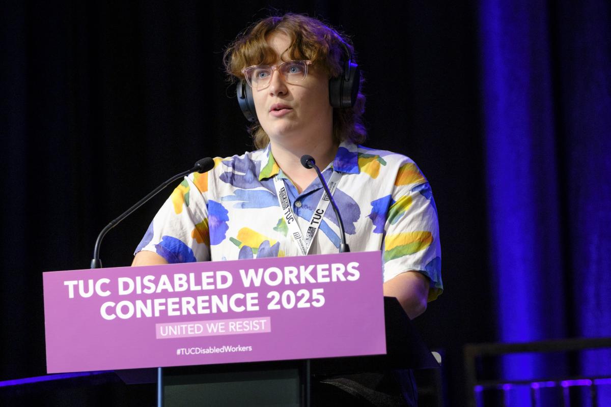 Jas speaking to the delegation- Photo by Jess Hurd