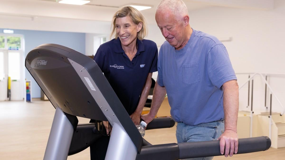 FLJun26Feature Physio tech Katie Christmas works with patient at Leatherhead Community Hospital exercise class [Lorne Campbell/Guzelian]